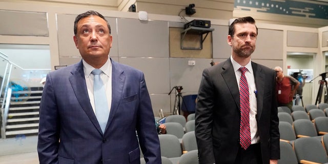 Miami police Chief Art Acevedo and his attorney John R. Byrne, arrive at Miami City Hall on Thursday for a hearing to determine his job. Acevedo was suspended after a tumultuous six-month tenure and fired Thursday. 
