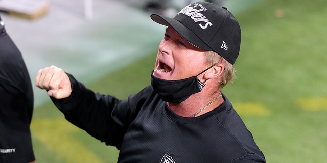 Las Vegas Raiders head coach Jon Gruden celebrates after defeating the New Orleans Saints in an NFL football game, Monday, Sept. 21, 2020, in Las Vegas.