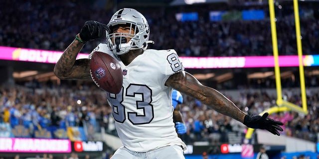 Las Vegas Raiders tight end Darren Waller reacts after scoring a touchdown during the second half of an NFL football game against the Los Angeles Chargers, Monday, Oct. 4, 2021, in Inglewood, California.