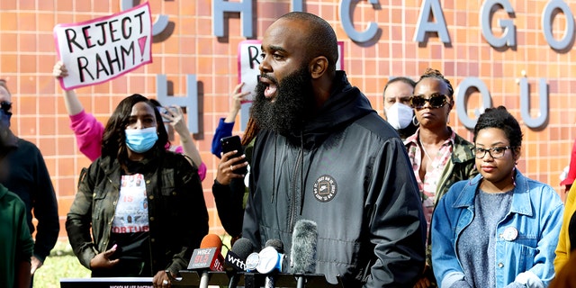 Community activist Will Calloway speaks at a rally in front of Chicago Police headquarters on Tuesday, Oct. 19, 2021, in Chicago. Calloway is among the activists calling on the Senate to reject Rahm Emanuel's nomination as President Joe Biden’s ambassador to Japan. (AP Photo/Teresa Crawford)