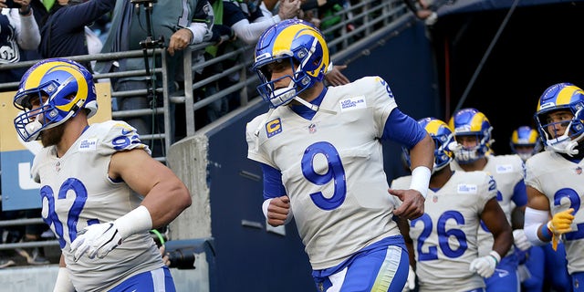 Quarterback Matthew Stafford #9 of the Los Angeles Rams takes the field before the start of the Rams and Seattle Seahawks game at Lumen Field on October 07, 2021 in Seattle, Washington.