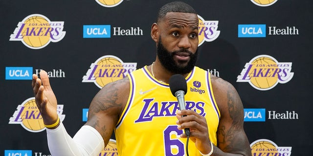 Los Angeles Lakers forward LeBron James fields questions during the NBA basketball team's Media Day Tuesday, Sept. 28, 2021, in El Segundo, California.