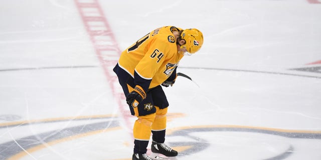 May 27, 2021; Nashville, Tennessee, USA; Nashville Predators center Mikael Granlund (64) reacts after an overtime loss against the Carolina Hurricanes in game six of the first round of the 2021 Stanley Cup Playoffs at Bridgestone Arena.
