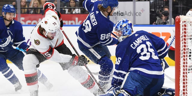 Toronto Maple Leafs goalie Jack Campbell (36) makes a save on Ottawa Senators forward Egor Sokolov (75) in the first period Oct. 9, 2021, at Scotiabank Arena in Toronto.