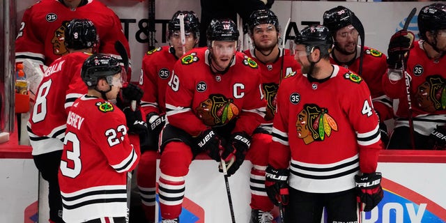 Oct 9, 2021; Chicago, Illinois, USA; Chicago Blackhawks center Jonathan Toews (19) sits during a time out during the third period at United Center. Mandatory Credit: David Banks-USA TODAY Sports
