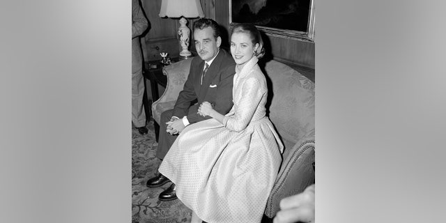In this Jan. 5, 1956 file photo, actress Grace Kelly and Prince Rainier III of Monaco, sit arm-in-arm as they meet the press in Philadelphia, Pa, USA.