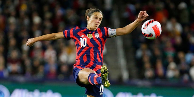 U.S. forward Carli Lloyd tries to stop the ball against South Korea in the first half of a soccer friendly match Oct. 26, 2021, in St. Paul, Minnesota.