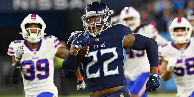 Tennessee Titans running back Derrick Henry (22) runs 76 yards for a touchdown against the Buffalo Bills in the first half of an NFL football game Monday, Oct. 18, 2021, in Nashville, Tenn.