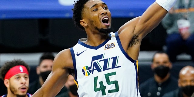 Utah Jazz's Donovan Mitchell goes up for a shot during the second half of an NBA basketball game against the Philadelphia 76ers, Wednesday, March 3, 2021, in Philadelphia.