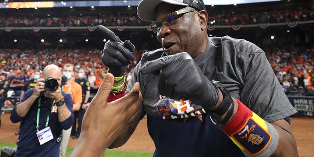 Manager Dusty Baker #12 of the Houston Astros celebrates after defeating the Boston Red Sox 5-0 in Game Six of the American League Championship Series to advance to the World Series at Minute Maid Park on Oct. 22, 2021 in Houston, Texas.