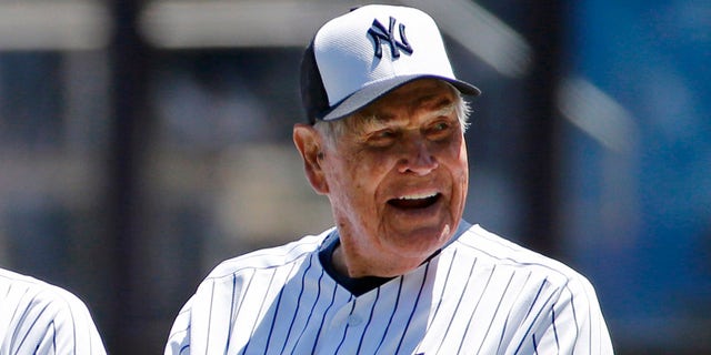 FILE - In this June 12, 2016, file photo, former New York Yankees player Eddie Robinson smiles before the Yankees annual Old Timers Day baseball game, in New York. Former big leaguer and general manager Eddie Robinson, who was the oldest living former MLB player, has died at age 100. The Texas Rangers, the team for which Robinson was GM from 1976-82, said he passed away Monday night, Oct. 4, 2021 at his ranch in Bastrop, Texas.