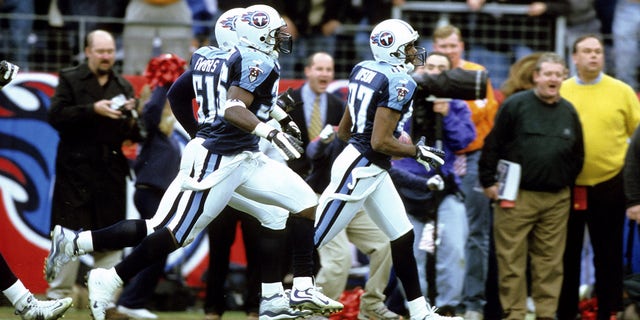 Tennessee Titans wide receiver Kevin Dyson (87) takes a kickoff return 75 yards for a touchdown during the AFC Wildcard Playoff, a 22-16 victory over the Buffalo Bills on January 8, 2000, at Adelphia Coliseum in Nashville, Tennessee.