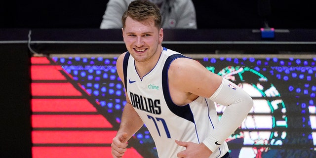 Dallas Mavericks guard Luka Doncic smiles after scoring during the first half in Game 1 of an NBA basketball first-round playoff series against the Los Angeles Clippers Saturday, May 22, 2021, in Los Angeles.