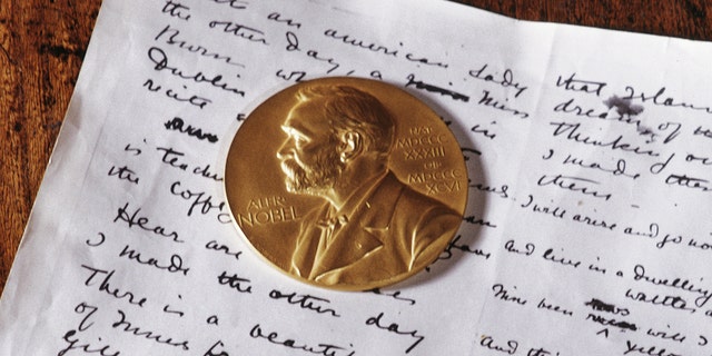 The Nobel gold medal and a manuscript belonging to Irish playwright and poet William Butler Yeats (1865-1939) on display at the Sligo museum, County Sligo, Ireland January 1968.  Yeats won the Nobel prize for literature in 1923.  (Photo by RDImages/Epics/Getty Images)