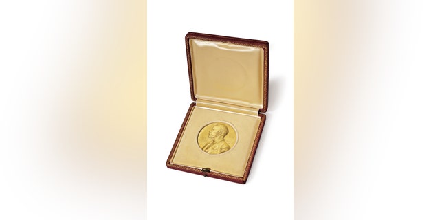 This undated photo provided by Christie's auction house shows James Watson's 1962 Nobel Prize medal (Associated Press)