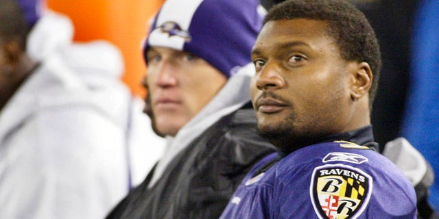 Baltimore Ravens quarterback Steve McNair sits on the bench after being taken out of the game in the fourth quarter of their NFL football game against the Cincinnati Bengals in Baltimore, Maryland, Nov. 11, 2007. Ravens tight end Todd Heap is seated to the left of McNair.