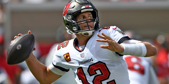 Tampa Bay Buccaneers quarterback Tom Brady (12) throws a pass against the Miami Dolphins during the first half of an NFL football game Sunday, Oct. 10, 2021, in Tampa, Florida.