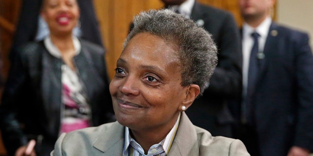 Chicago Mayor-elect Lori Lightfoot smiles during a press conference at the Rainbow PUSH organization, Wednesday, April 3, 2019, in Chicago.