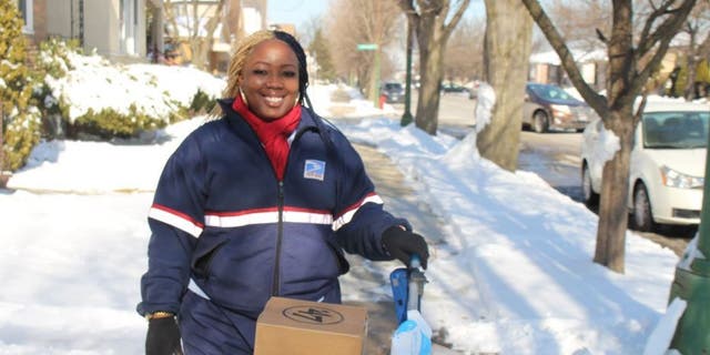 Shonda Lemon, 34, working at her job as a USPS mail carrier in Chicago (Photo courtesy of Shonda Lemon/Fox Television Stations)