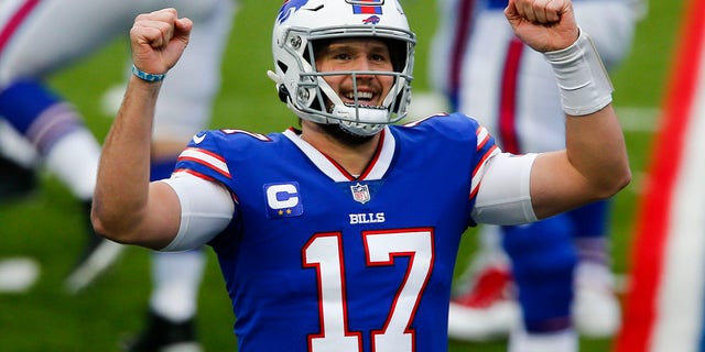 Buffalo Bills quarterback Josh Allen (17) reacts after throwing a touchdown pass in the first half of an NFL football game against the Miami Dolphins, Sunday, Jan. 3, 2021, in Orchard Park, N.Y. (AP Photo/John Munson)