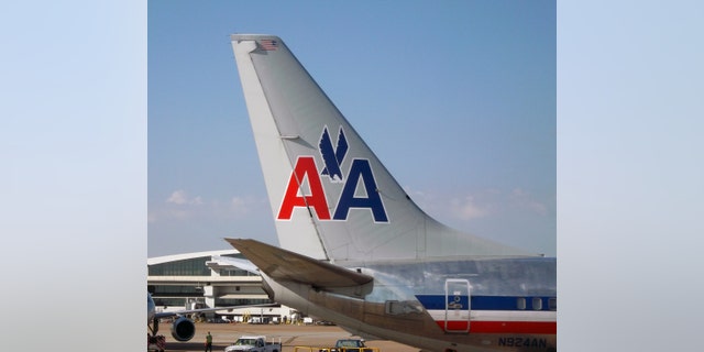Milwaukee, Michigan, USA - July 14, 2014: Tail section of American Airlines 737 airplane. This aircraft was produced by the Boeing company.