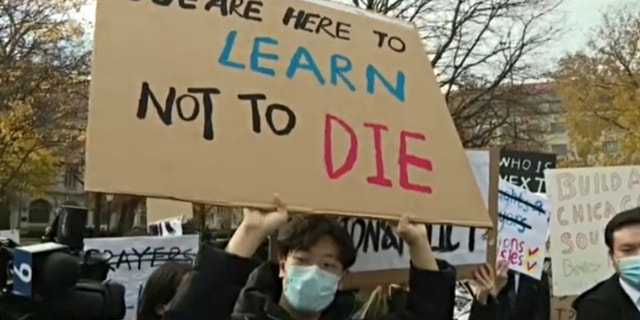 University of Chicago students protest the fatal shooting death of Shaoxiong Zheng. (FOX 32 Chicago)