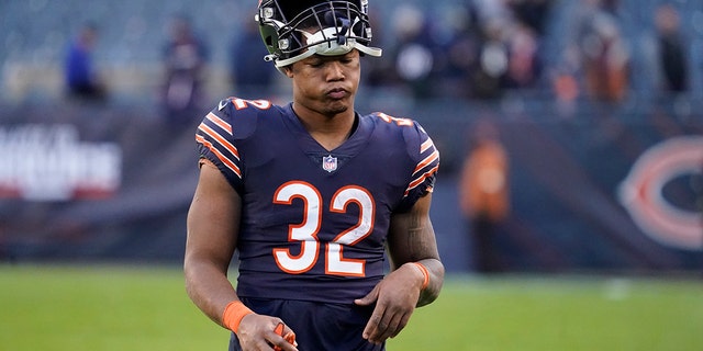 Chicago Bears running back David Montgomery walks off the field after the team's 16-13 loss to the Baltimore Ravens during the second half of an NFL football game Sunday, Nov. 21, 2021, in Chicago.