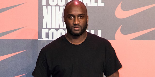 Virgil Abloh poses for photographers upon arrival at the Nike Celebrates The Beautiful Game event, in London on Wednesday, Feb. 7, 2018.  Abloh, a leading fashion executive hailed as the Karl Lagerfeld of his generation, has died after a private battle with cancer. He was 41. 