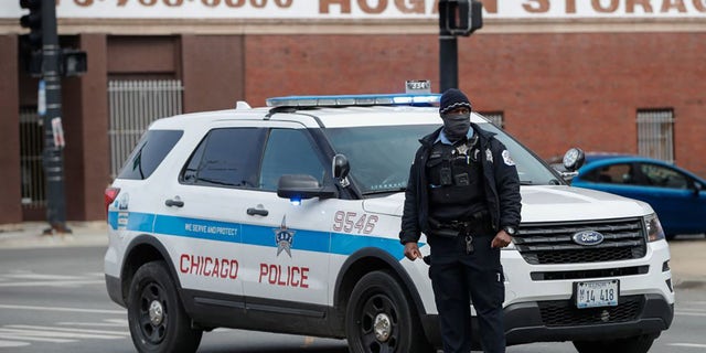 Chicago police on Monday arrested a 17-year-old boy in connection to two armed robberies in the city's Lakeview neighborhood last month. (Photo by KAMIL KRZACZYNSKI/AFP via Getty Images)