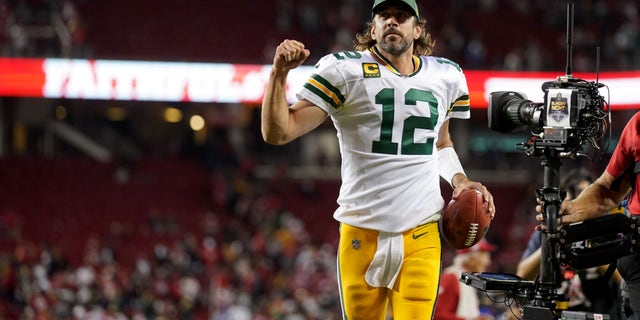 Green Bay Packers quarterback Aaron Rodgers jogs toward the locker room after the Packers defeated the San Francisco 49ers 30-28 at Levi's Stadium.