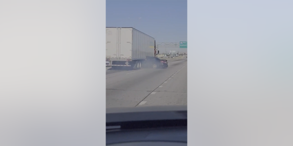 Semitrailer drags sedan down Illinois highway in captured video footage
