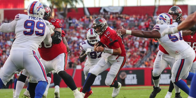 Buccaneers quarterback Tom Brady runs the ball for a first down against the Buffalo Bills on Dec. 12, 2021, at Raymond James Stadium in Tampa, Florida. 