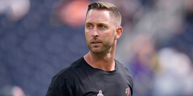 Arizona Cardinals coach Kliff Kingsbury walks on the field before the Oct. 3, 2021, game against the Los Angeles Rams in Inglewood, California.