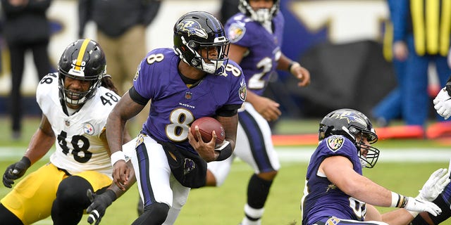 Baltimore Ravens quarterback Lamar Jackson (8) scrambles against the Pittsburgh Steelers during the first half of an NFL football game, Sunday, Nov. 1, 2020, in Baltimore. (AP Photo/Nick Wass)