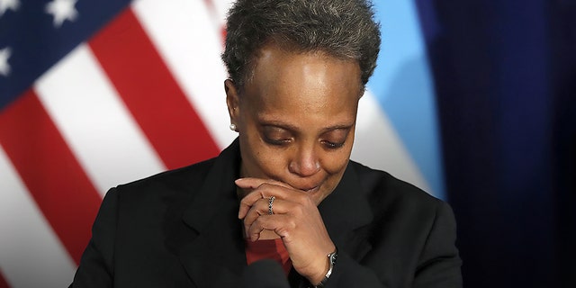 Mayor Lori Lightfoot, shown at City Hall on April 15, 2021, said Monday that a âvery small numberâ of Chicago police officers have been placed on no-pay status for refusing to comply with the cityâs requirement that they report their vaccine status. 