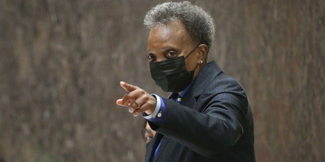 Mayor Lori Lightfoot presides over a city council meeting in 2021 in Chicago.