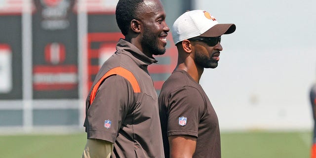 Cleveland Browns Vice President of Football Operations Kwesi Adofo-Mensah, left to right, and GM Andrew Berry watch the action from the sidelines at training camp, August 27, 2021, at CrossCountry Mortgage Campus in Berea, Ohio. Adofo-Mensah has emerged as the front-runner for the Minnesota Vikings' general manager job. Adofo-Mensah was in Minnesota for his second formal interview with the organization on Tuesday, Jan. 25, 2022.