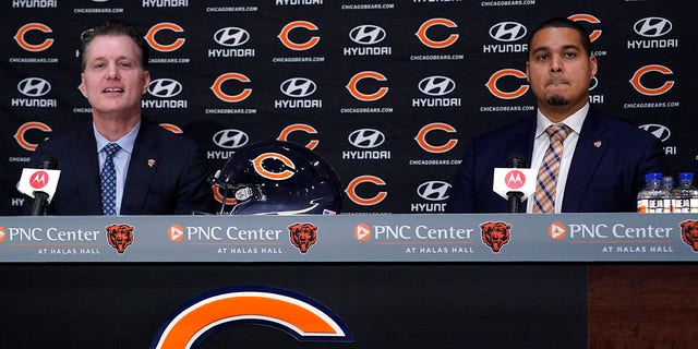 Chicago Bears new NFL football team head coach Matt Eberflus, left, and new general manager Ryan Poles listen to a question during a news conference at Halas Hall in Lake Forest, Ill., Monday, Jan. 31, 2022.