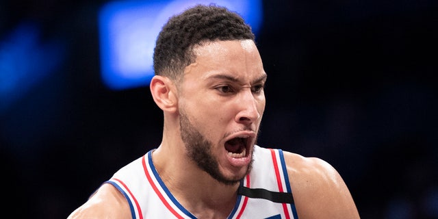 Philadelphia 76ers guard Ben Simmons reacts after grabbing a rebound during the second half of an NBA basketball game against the Brooklyn Nets in New York, in this Monday, Jan. 20, 2020, file photo.