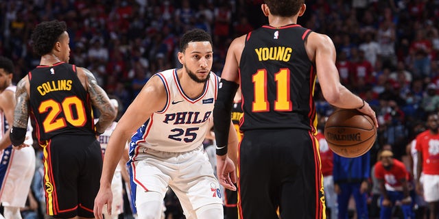 Ben Simmons #25 of the Philadelphia 76ers plays defense against Trae Young #11 of the Atlanta Hawks during Round 2, Game 7 of the Eastern Conference Playoffs on June 20, 2021 at Wells Fargo Center in Philadelphia, Pennsylvania. 