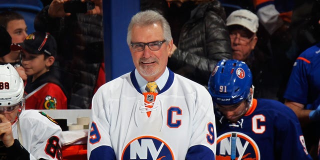 Former New York Islander Clark Gillies is honored prior to the game against the Chicago Blackhawks at the Nassau Veterans Memorial Coliseum on Dec. 13, 2014, in Uniondale, New York. 