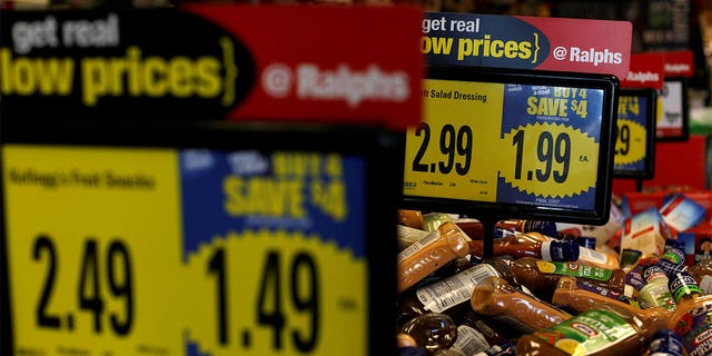 FILE PHOTO: Price tags are pictured at a Ralphs grocery store, which is owned by Kroger Co, ahead of company results in Pasadena, California U.S., December 1, 2016. REUTERS/Mario Anzuoni/File Photo