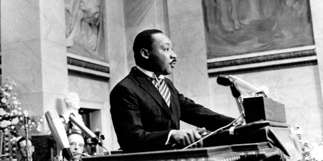 Dr. Martin Luther King Jr. delivers his Nobel Peace Prize acceptance speech in the auditorium of Oslo University in Norway on Dec. 10, 1964. (AP Photo)