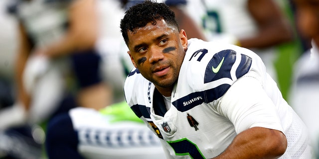 Russell Wilson of the Seattle Seahawks looks on during warmups prior to a game against the Los Angeles Rams at SoFi Stadium on Dec. 21, 2021, in Inglewood, California.