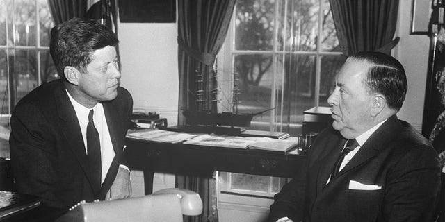 Chicago mayor Richard Daley and President John F. Kennedy discuss the need for a department of urban affairs in the White House (Getty Images)