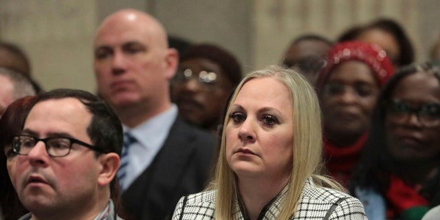 In this Friday, Jan. 18, 2019 file photo, Tiffany Van Dyke, wife of former Chicago police Officer Jason Van Dyke, attends his sentencing hearing at the Leighton Criminal Court Building, in Chicago, for the 2014 shooting of Laquan McDonald.