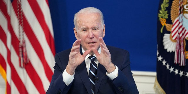 U.S. President Joe Biden delivers remarks on the administration's coronavirus surge response in the South Court Auditorium at the White House in Washington, U.S., January 13, 2022. 