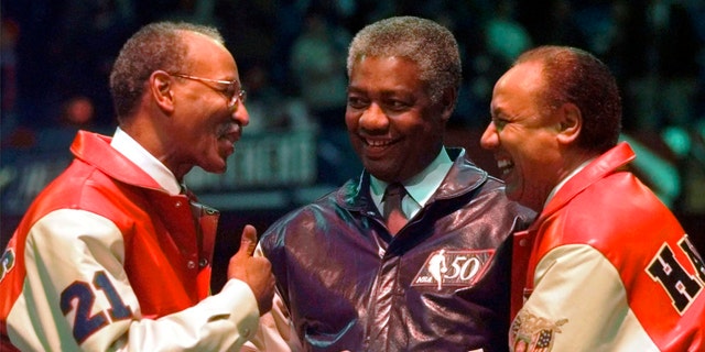 NBA Legends Dave Bing, left, Oscar Robertson, center, and Lenny Wilkens chat during halftime ceremonies of the NBA All-Star game Sunday, Feb. 9, 1997, in Cleveland.