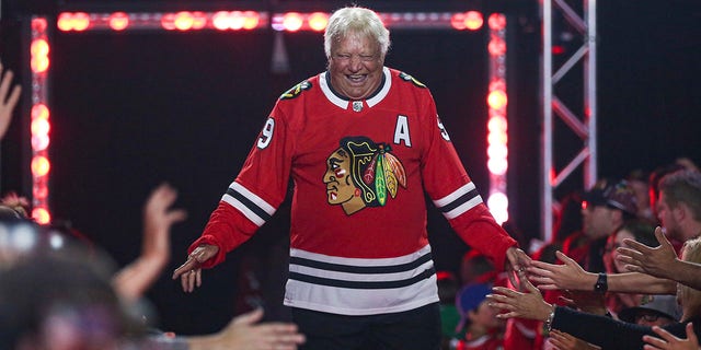 FILE - Former Chicago Blackhawks player Bobby Hull is introduced to fans during the NHL hockey team's convention in Chicago, Friday, July 26, 2019. Hall of Fame forward Bobby Hull is no longer serving as a team ambassador for the Chicago Blackhawks. "When it comes to Bobby, specifically, we jointly agreed earlier this season that he will retire from any official team role," the team said in a statement Monday, Feb. 21, 2022.