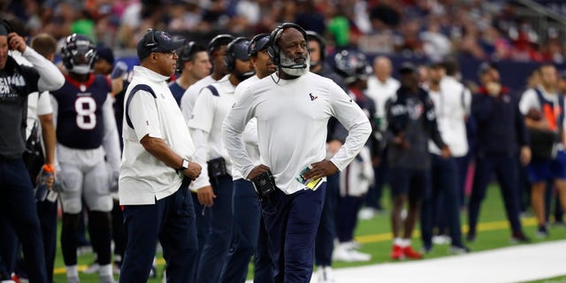 Defensive coordinator Lovie Smith reacts during the second half against the New England Patriots at NRG Stadium on October 10, 2021 in Houston, Texas. 